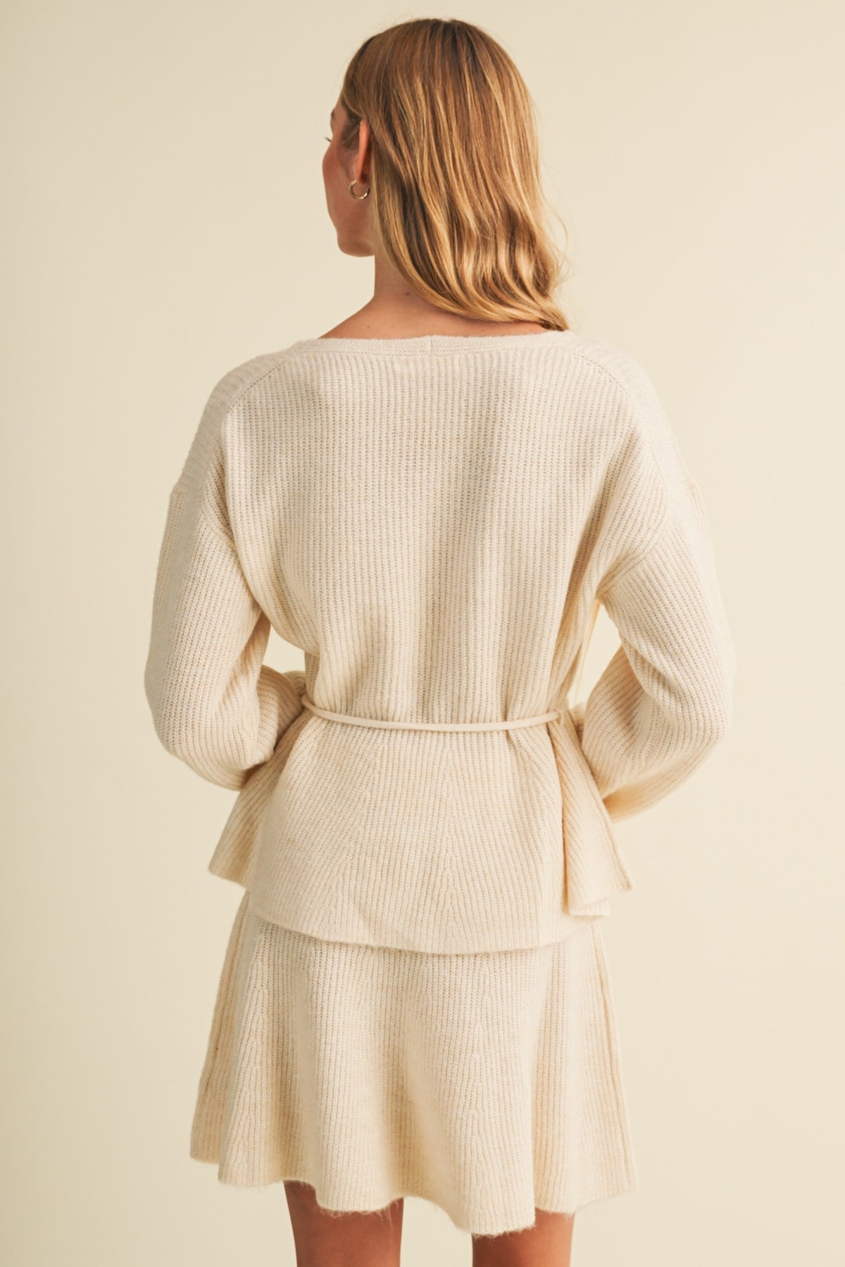 Ivory Drawstring Peplum Sweater