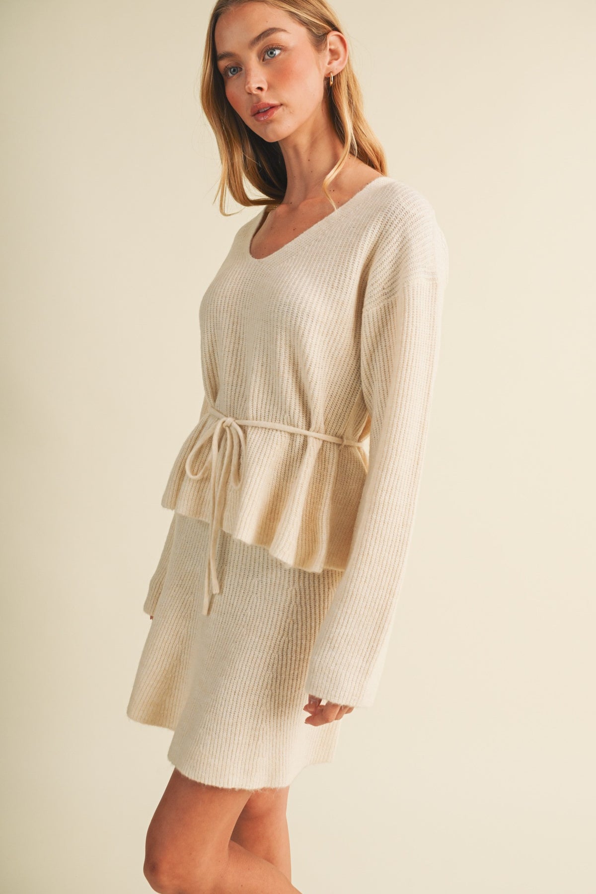 Ivory Drawstring Peplum Sweater