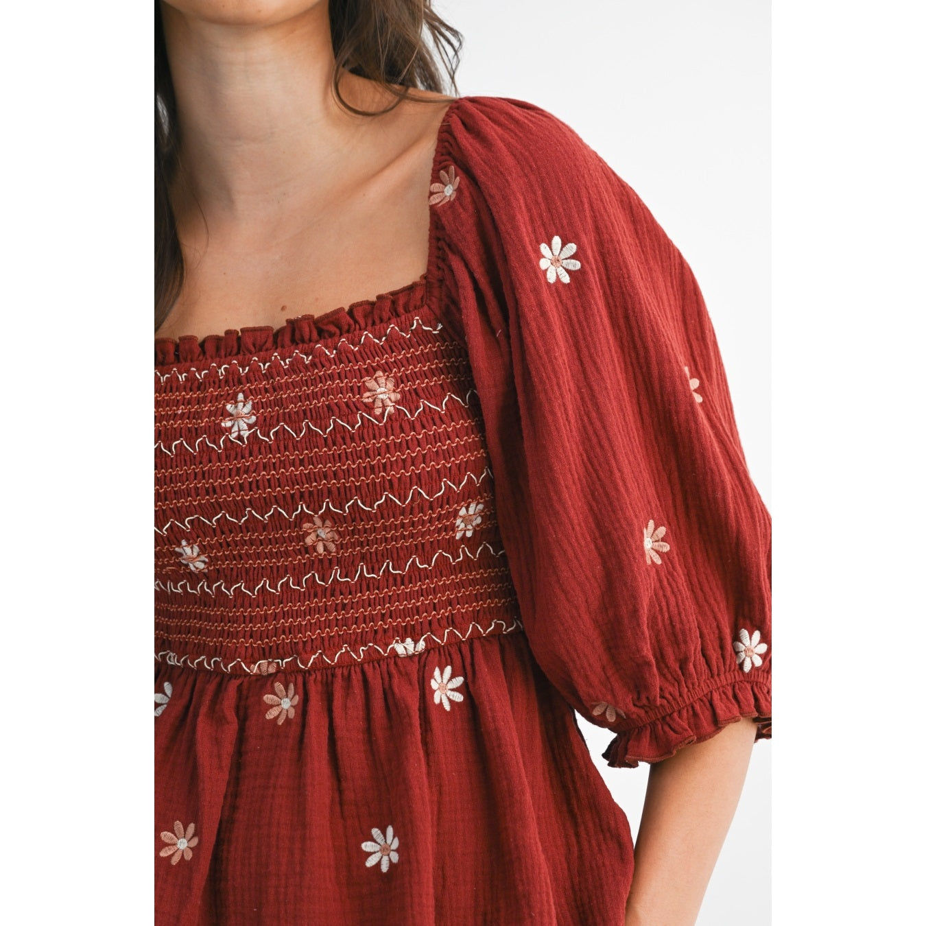 Rust Smocked Embroidered Peplum